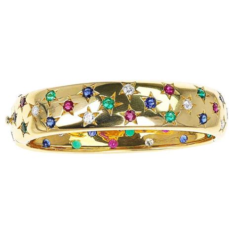 French Cartier Star Bangle With Ruby Emerald Sapphire And Diamond