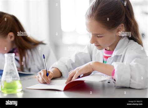 Kids Studying Chemistry At School Laboratory Stock Photo Alamy