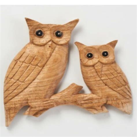 Hand Carved Wooden Owls On Branch