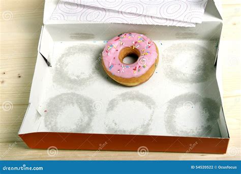 Empty Cakes Box With Only One Tempting And Delicious Donut With