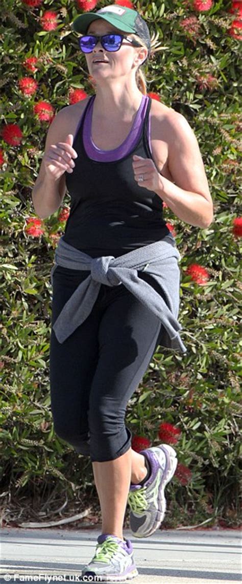 reese witherspoon dons form fitting workout gear as she goes jogging daily mail online