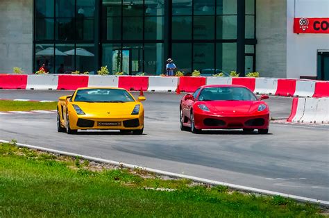 Bienvenue sur votre site de vente en ligne dédié au monde de l'accessoire auto. Lamborghini Gallardo (yellow) and Ferrari F430 (red) on the track at Exotic Rides Mexico. Exotic ...