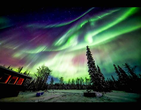 The Northern Lights Illuminate The Night Sky In The North Pole Alaska