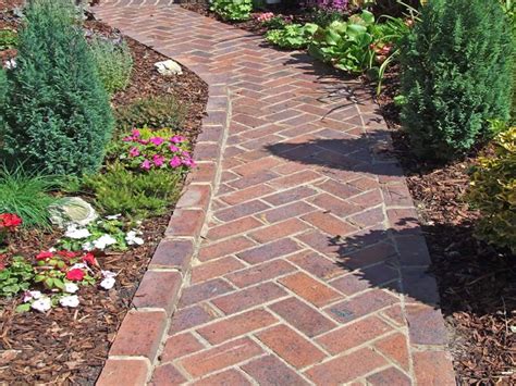 This is usually taken to be a line along the main direction of travel or one that is parallel or at right angles to the house or other building. herringbone brick path | Backyard garden layout, Garden ...