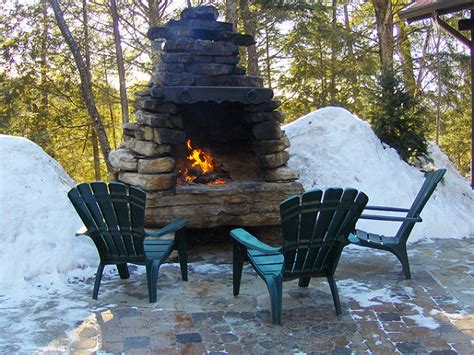 Stone and brick surrounds cost between $3,500 to $5,000. DIY Outdoor Fireplace for Back Yard