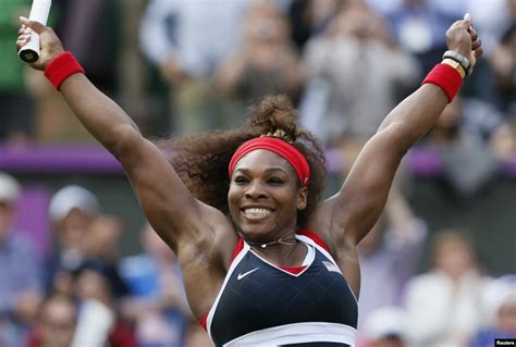 Serena gives her tennis star in the making a big high five after they put in work. Serena Williams Captures Olympics Tennis Gold