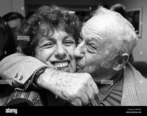 Man Gives A Big Kiss To His Wife At A Senior Center In Brooklyn Ny