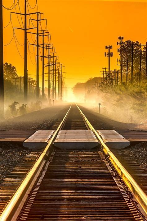 Railroad Sunrise Michigan Usa By Kenneth Raymond On