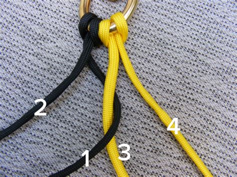 Slide the cords through the eye of a swivel snap and pull it to the middle. Make A Paracord Dog Leash