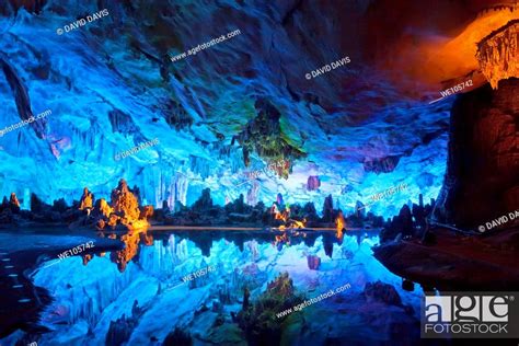 The Beautifully Illuminated Reed Flute Caves Displaying The Crystal