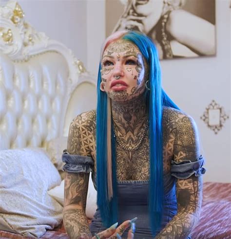 Amber Luke Who Has Spent 50k On 600 Tattoos Covers Them Up To See How She Looks Daily Mail Online