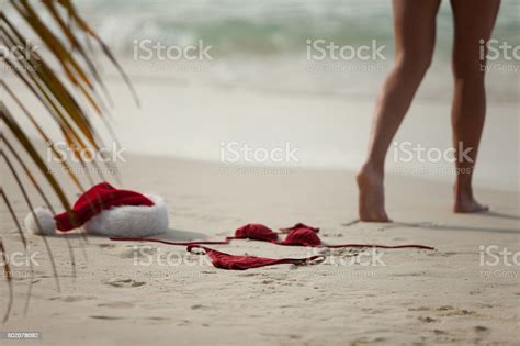 Woman Took Off Her Christnmas Outfit At A Caribbean Beach Stock Photo