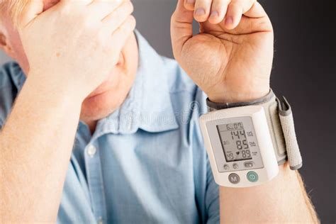 Health Problem High Blood Pressure Man Measuring His Blood Pressure