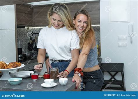 cute lesbian couple happily preparing breakfast lgtb concept stock image image of lgbt