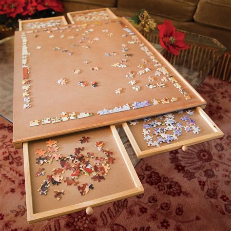 The main board is made from an old large dry erase board and a foam sheet to create extra working mats. puzzle: jigsaw puzzle storage with drawers
