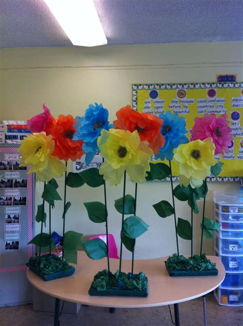 Scan your 4k copy, or the facebook cover photo and follow the yellow brick road to emerald city! Giant flowers made from tissue paper for school "Wizard of ...