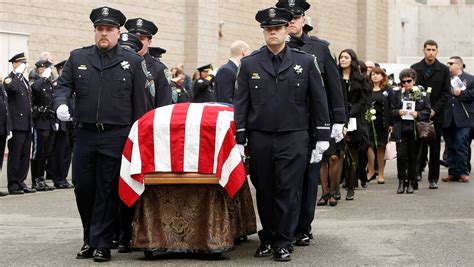 funeral held for rookie officer killed in shooting