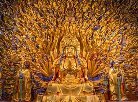 Golden Sculpture Of Avalokiteshvara Buddha Or Guanyin With Thousand