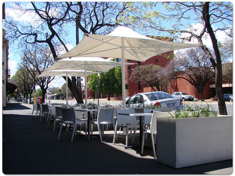 Print your company name or logo on the canopy to increase brand awareness. Restaurant & Cafe Umbrellas