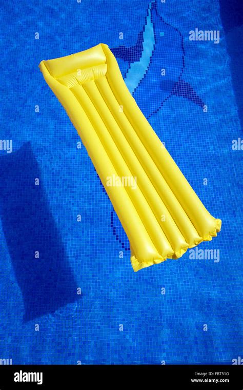 Airbed In A Swimming Pool Stock Photo Alamy