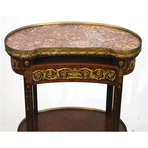 Kidney shaped activity tables are preschool teachers' favorite student desks because they can sit up to five students for tutoring or group activities. Louis XVI Style Gilt-Bronze Mounted Kidney-Shaped Side Table For Sale at 1stdibs