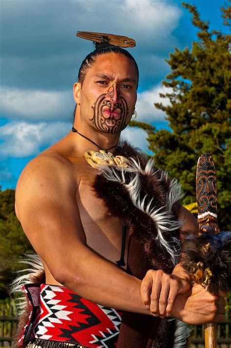 A Maori Warrior With A Ta Moko Facial Tattoo Performs A War Haka Dance Te Puia New Zealand