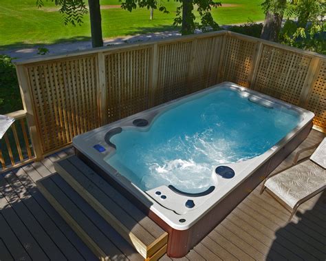 Hot Tub Energy Saving Tip Installing A Fence Around Your Hot Tub Or Swim Spa Can Provide