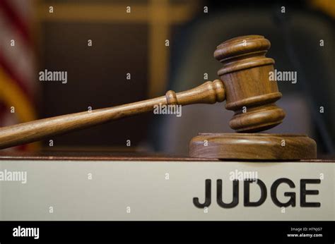 Gavel Up At Judges Bench With Sign Chair And Flag Stock Photo Alamy