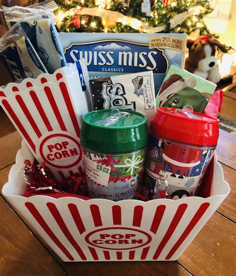 Dollar stores are true gold mines for those who like putting together gift baskets for christmas. Dollar Tree Movie Night Gift Basket - Glitter On A Dime