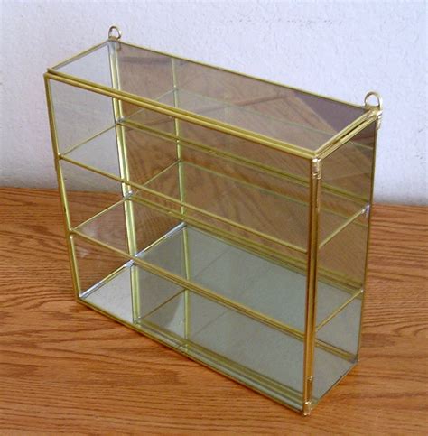 Brass And Glass Curio Display Cabinet Etsy Display Cabinet Glass Curio