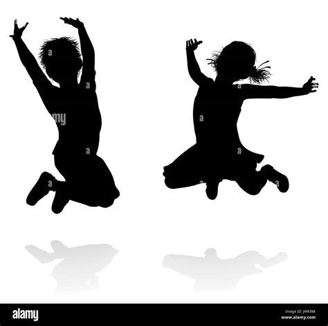 Happy Boy And Girl Silhouette Kids Or Children Jumping Stock Photo Alamy