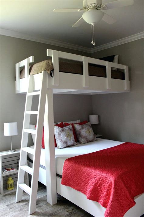 Crafted from durable metal, the triple bunk bed features a bold metal piping design with rugged panel accents. Loft Beds Cottage Loft Bed Perpendicular Twin Over Queen Rustic Bunk Beds Twins Queens And Pin ...
