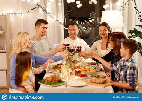 Gather round the table for a relaxed and cozy dinner party featuring the easiest, most impressive salmon you'll ever make. Happy Family Having Dinner Party At Home Stock Photo ...