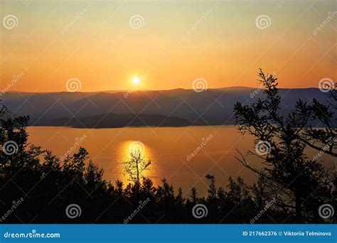 Beautiful Orange Sunset Over The Mountains In Summer The Rays Of The