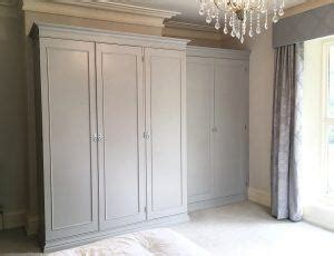Apply a second coat of paint after the first coat dries. Painting fitted wardrobes | Traditional Painter
