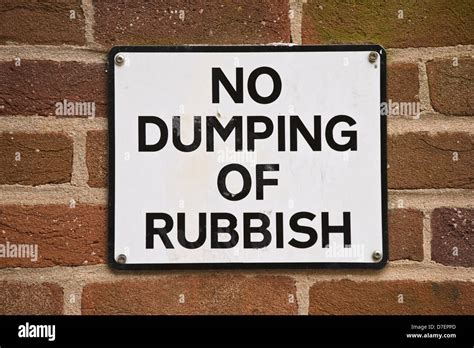 Street Sign No Dumping Of Rubbish Fixed To Wall In Exeter Devon England
