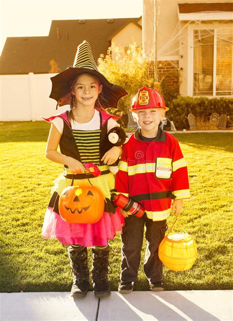 Kids Going Trick Or Treating On Halloween Stock Photo Image Of