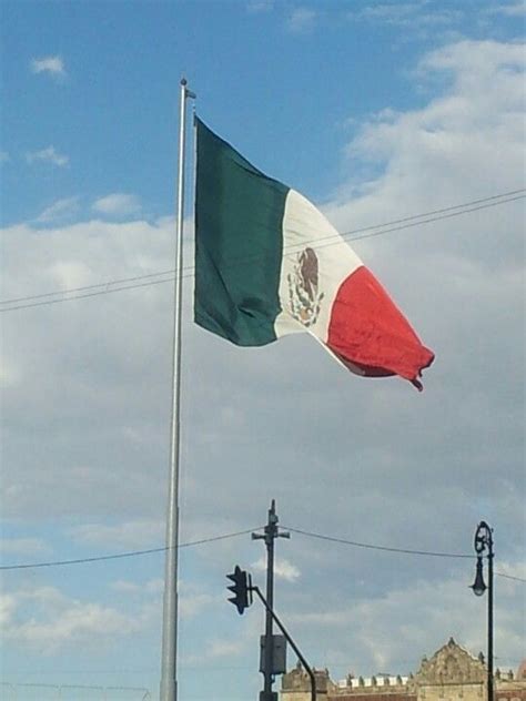 Soldiers from the mexican army ceremoniously raise an enormous flag each and every morning in the central zócalo square in mexico city. most of my family was born in mexico | Mexico flag, Mexico ...