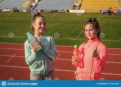 Happy Kids Hold Sports Drinks Sports And Hydration Stock Image Image