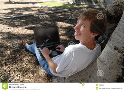 Use a firewall windows 10 and windows 8 have a firewall already built in and automatically turned on. Computer Guy Working Outside On Laptop Under Tree Stock ...