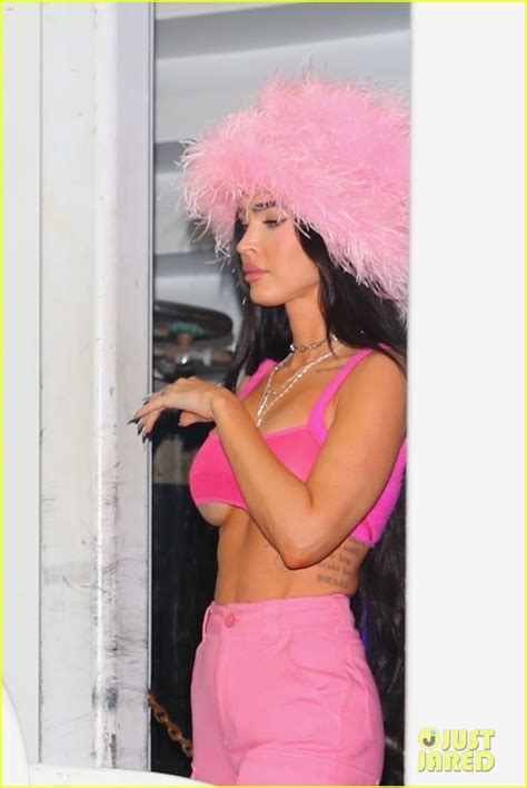 Megan Fox Wears Pink Fuzzy Bucket Hat To Machine Gun Kellys Concert
