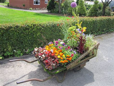 How To Decorate The Garden With Some Wheelbarrow Planters