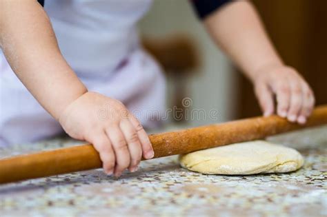 Hands Baking Dough With Rolling Pin On Table Little Chef Bake In