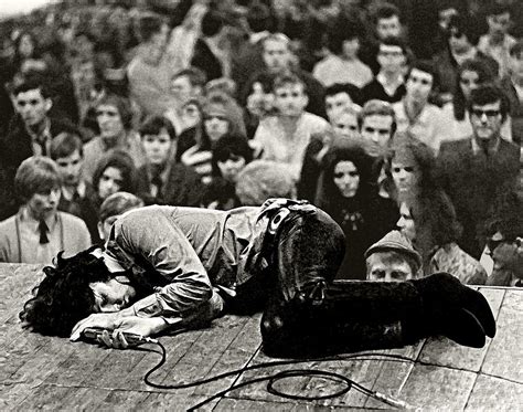 Jim Morrison Laying On Stage During A 1968 Concert For The Doors Rock