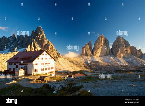 Three Peaks Hut And Chapel In Front Of Parternkofel And North Faces Of