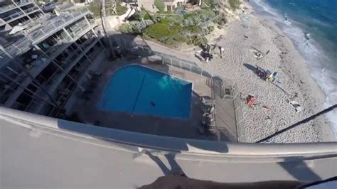 Man Jumps From Hotel Roof Into Swimming Pool Booth Video Is Heart