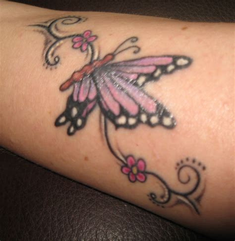 Some people like getting butterfly tattoos to get themselves motivated and keep going in life. butterfly wrist tattoo | EntertainmentMesh