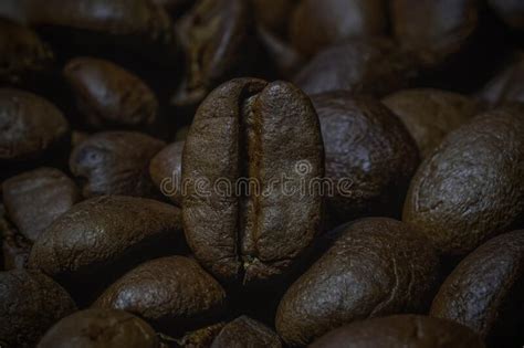 Roasted Coffee Beans Closeup Background Coffee Grains Scattered On The