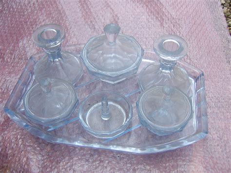 Lastly, choose a dressing table with stool as a set, so there is no risk of alongside your dressing table try matching it with a new wardrobe or chest of drawers. 1940's Blue Glass Trinket Set for Dressing Table - The ...
