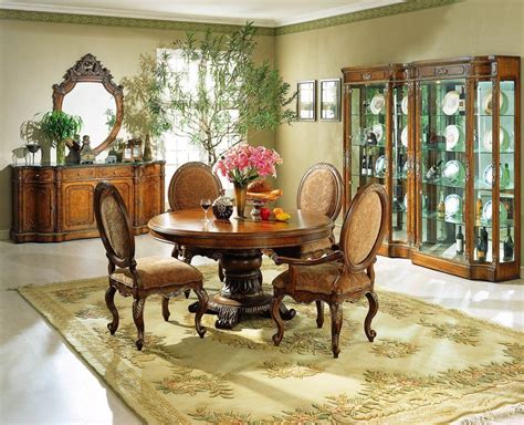 Solid and stylish art deco. The Tapestry Formal Round Dining Room Collection